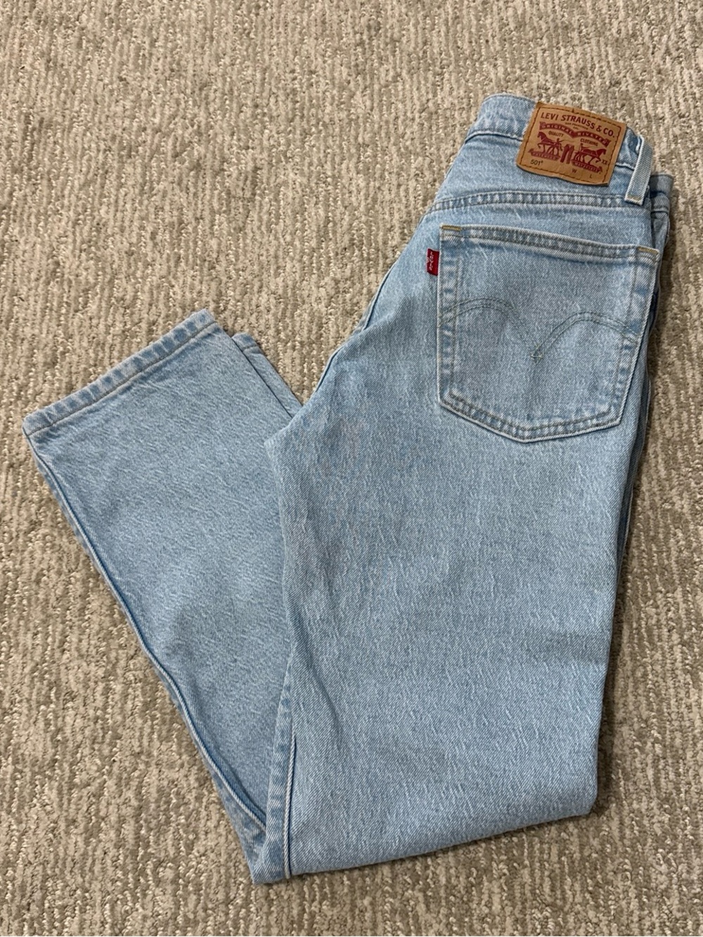 Levi’s 501 light blue cropped high-waisted mom jeans